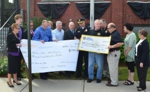Golden LivingCenters and St. Michael’s Law Enforcement Organization donated $1,500 to the Melrose Police Department's Melrose Alert Community Response Program on Sept. 25. (Courtesy Photo)